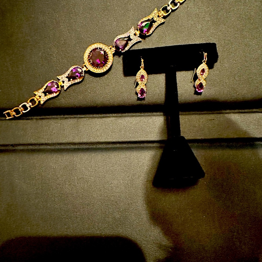 Gold over sterling (Vermeil) bracelet and earrings. Amethyst w/white sapphires.